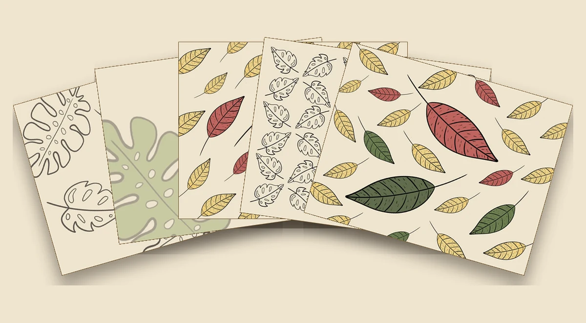 Five blank SolarGrove postcards fanned out, showing a spread of the botanical designs